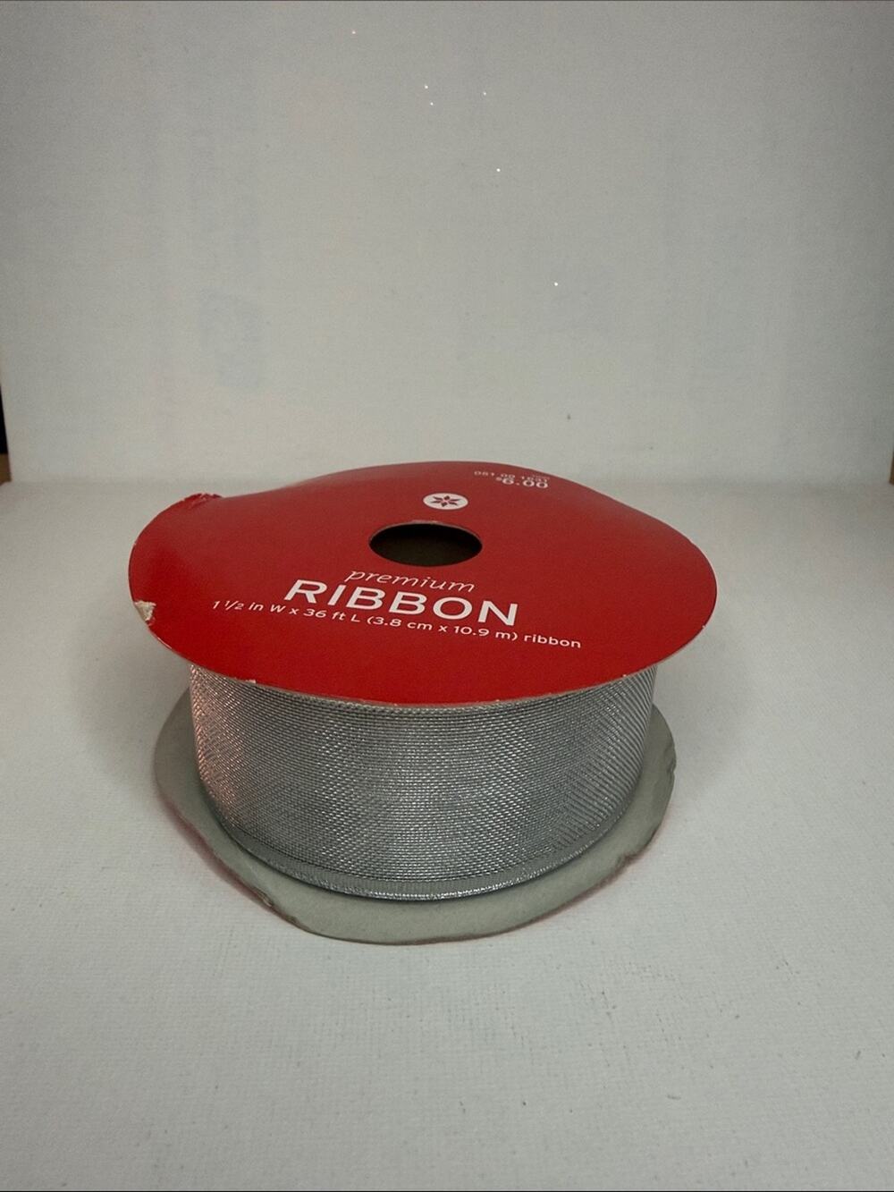 Silver Metallic Ribbon on Red Spool